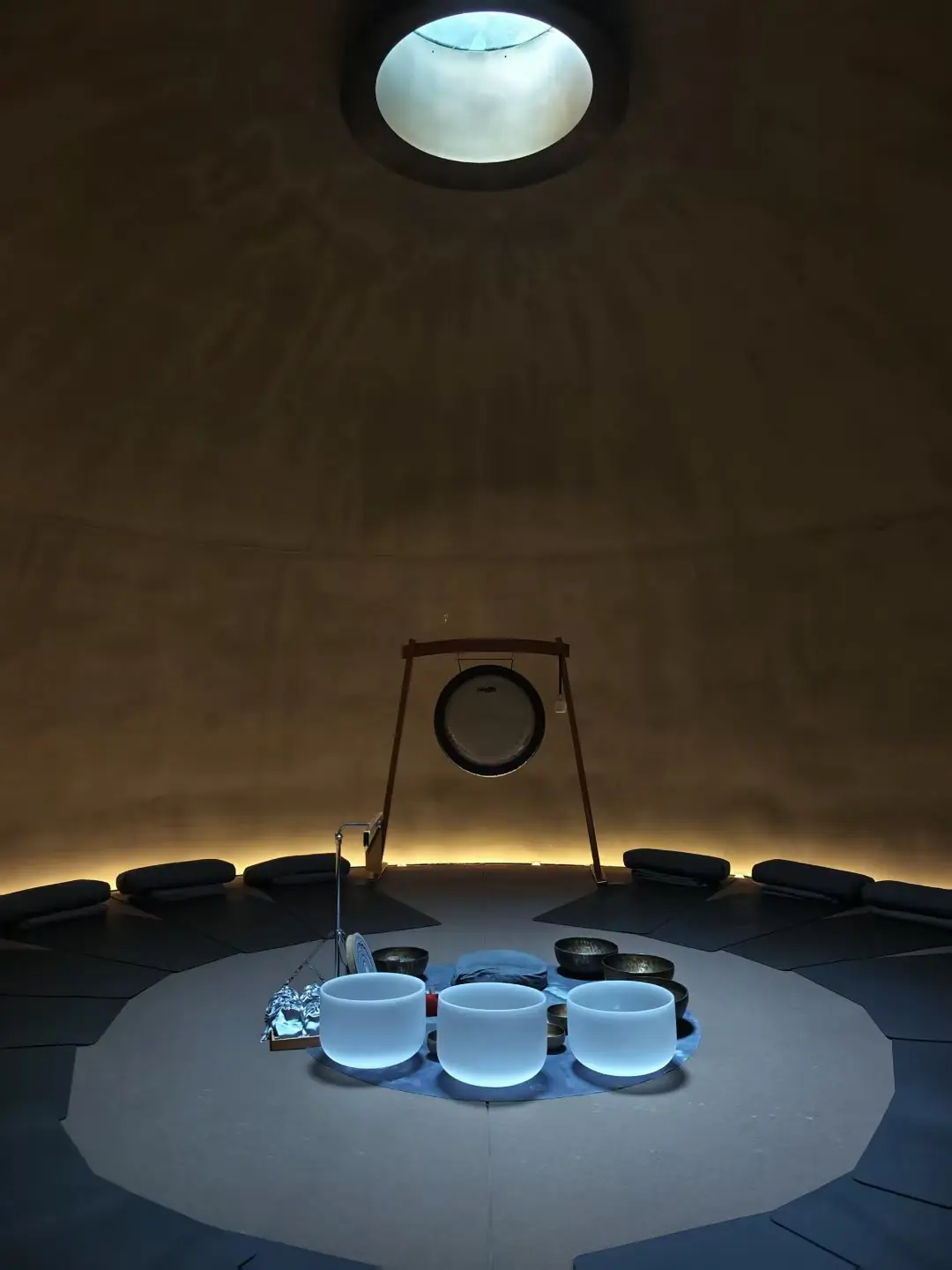 Singing bowls arranged for a sound-based mind-restoration session